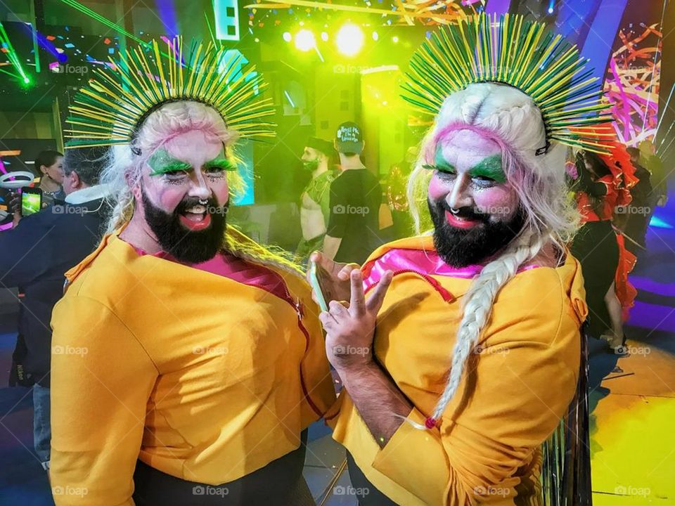 Two guys twinning at a portuguese festival.
Lisbon, Portugal.