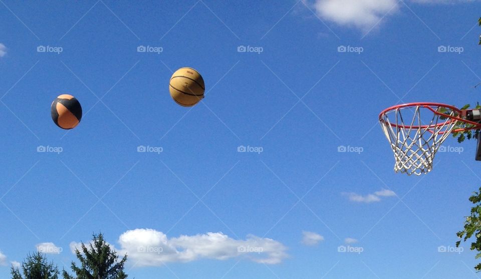 2 floating basketballs 