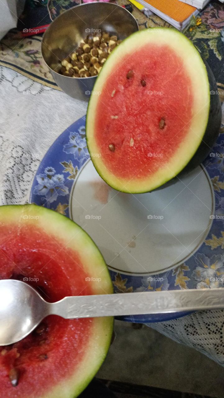 yummy for my empty tummy cut into half with a lot of juice in it