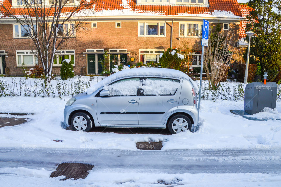 Car Covered Under Snow