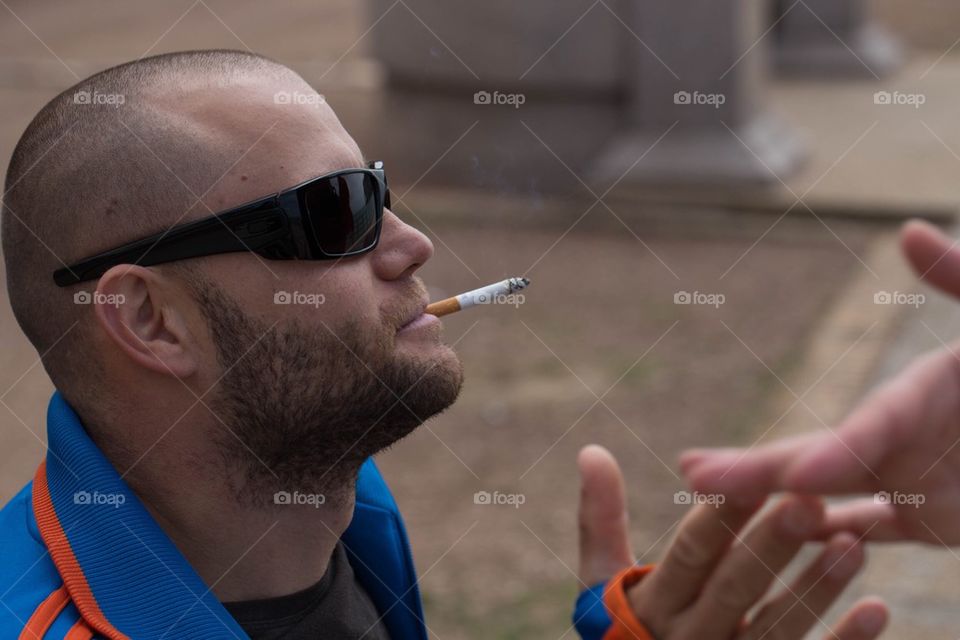 Guy/ man smoking a cigarette