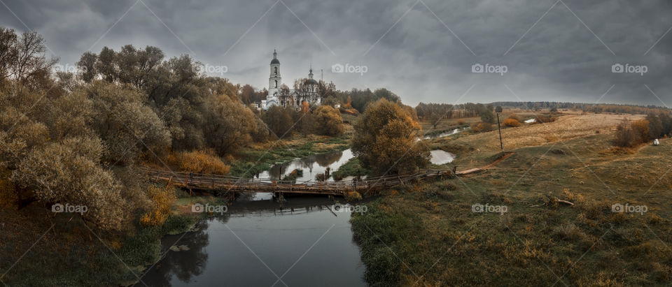 Orthodox Church on a river, autumn aerial landscape, Russia, Vladimir region 