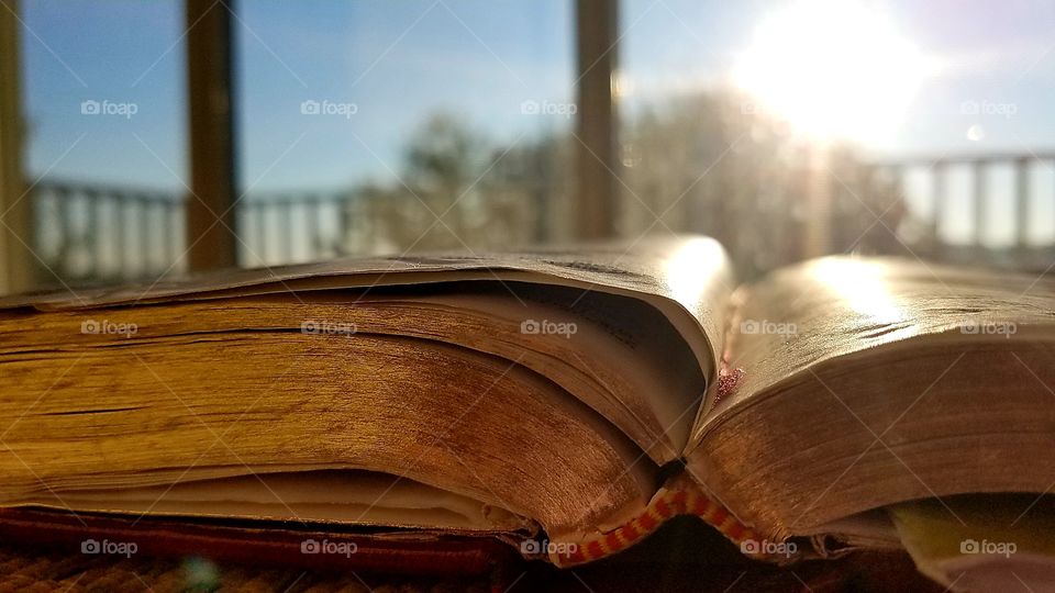 Book on window seat on a very sunny morning!!