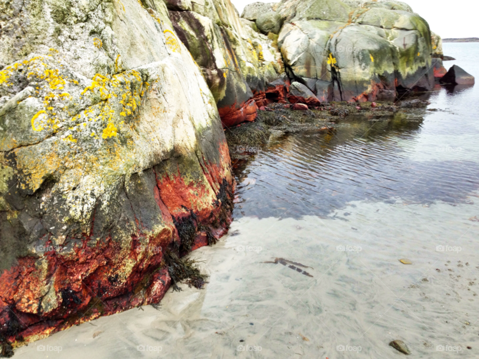 beach sand sea rocks by haq