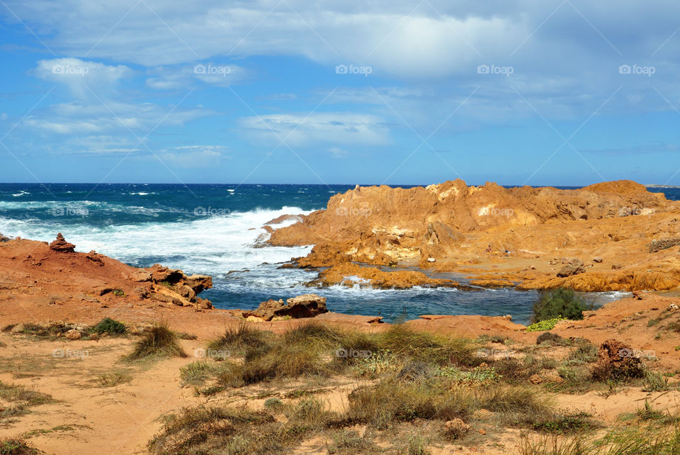 cliffs and beach on menorca Balearic island in Spain