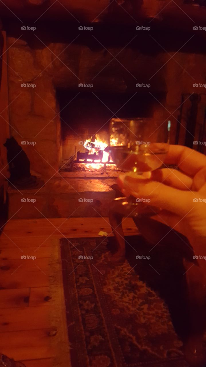 Tiny drink by the fire