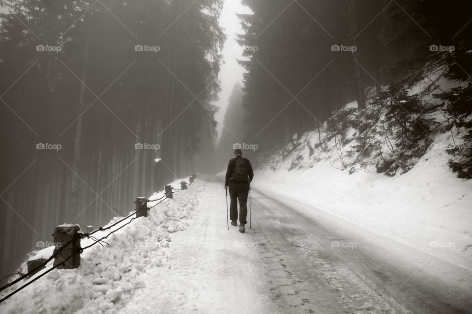 Hiking man in winter