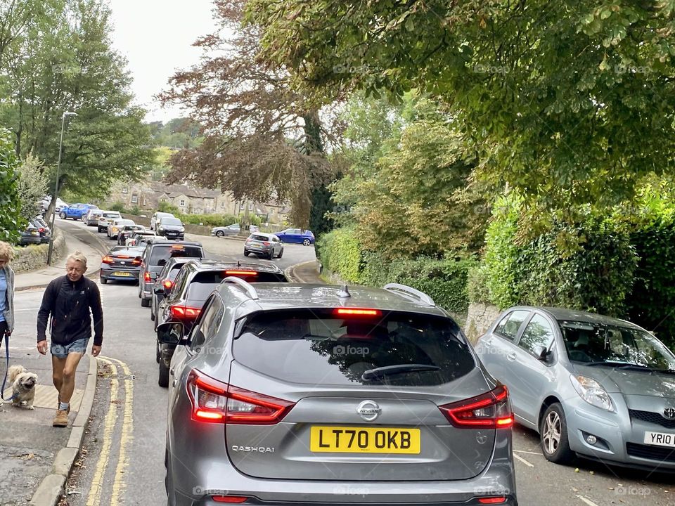 Busy commute in town centre cars at rush hour