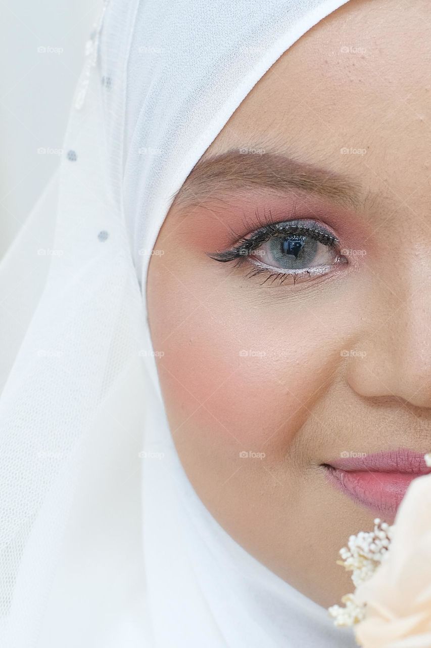 Beautiful bride with eye and eyeshadow in make up .