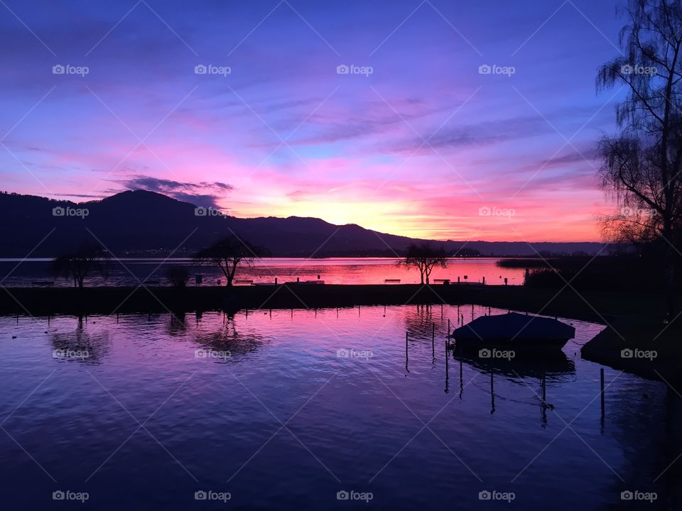 Dramatic sky reflecting in lake