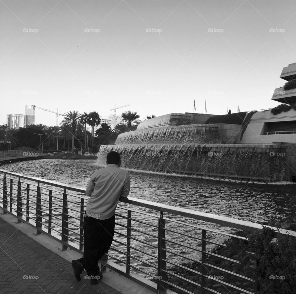 Man by the fountain 