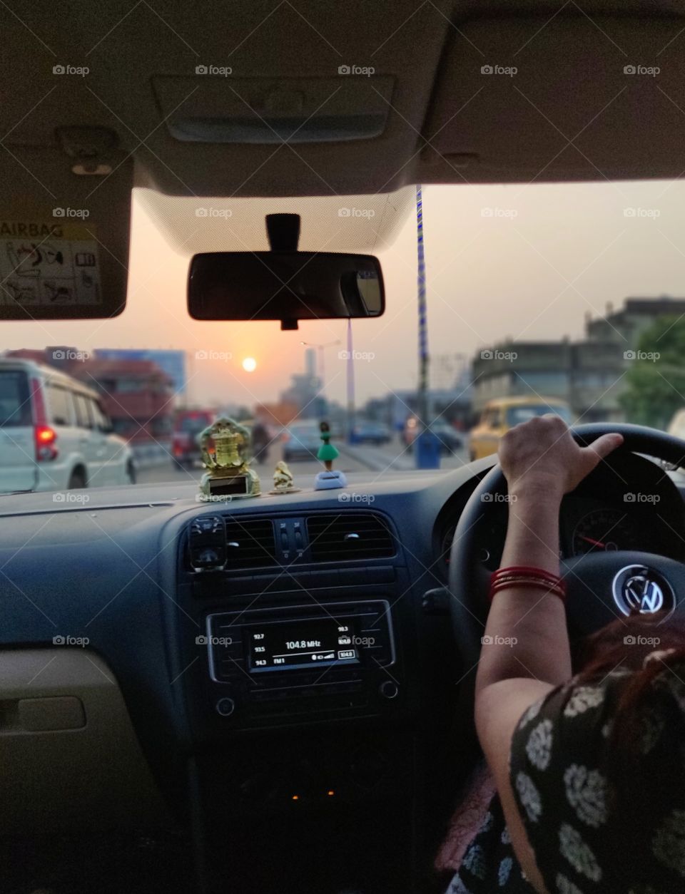 oh the monotonous daily routine of driving back from work to home 😐...the only thing I like is witnessing a sunset sometime on the way..life is good 🙂