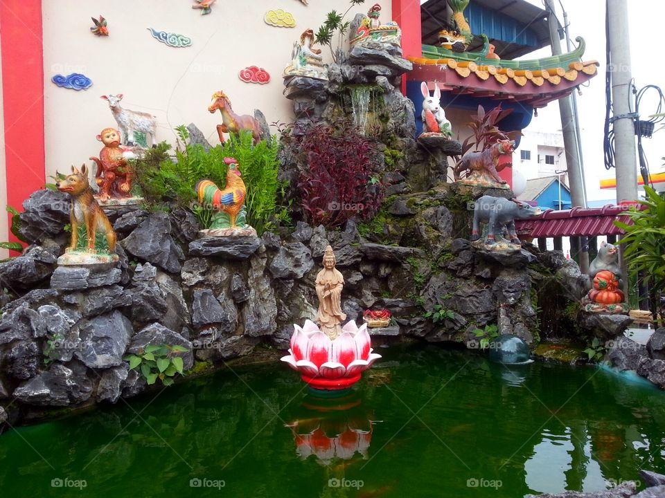 Chinese Zodiac Fountain. Seen in a buddhist temple