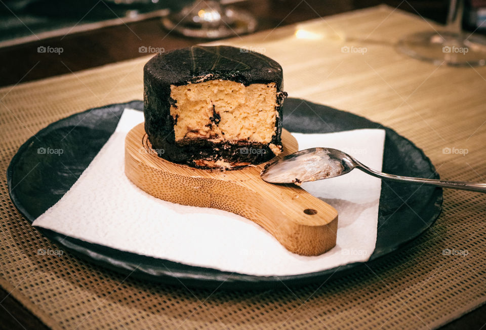 A chocolate cake served as a dessert