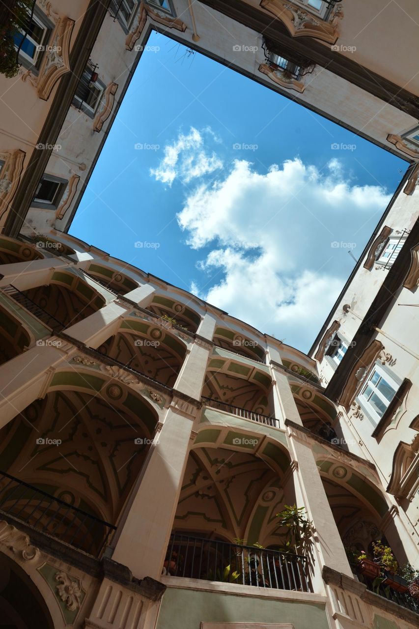 city ​​center of Naples, interior of the buildings with a view of the sky