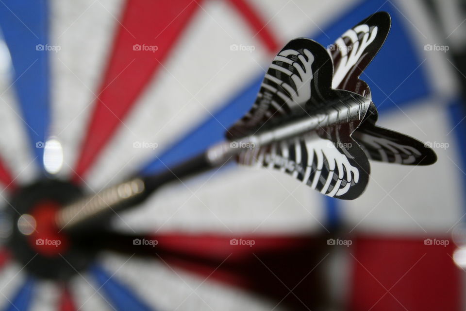 Dart hitting the bullseye