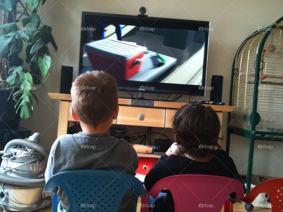 Kids watching their favorite movie