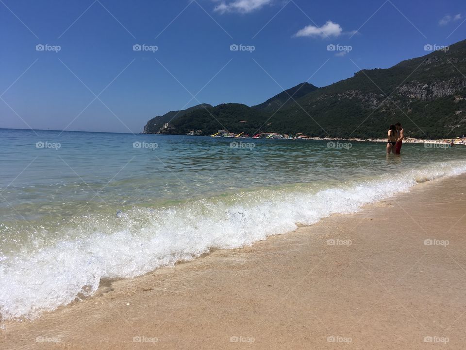 Romantic couple in the paradise beach 