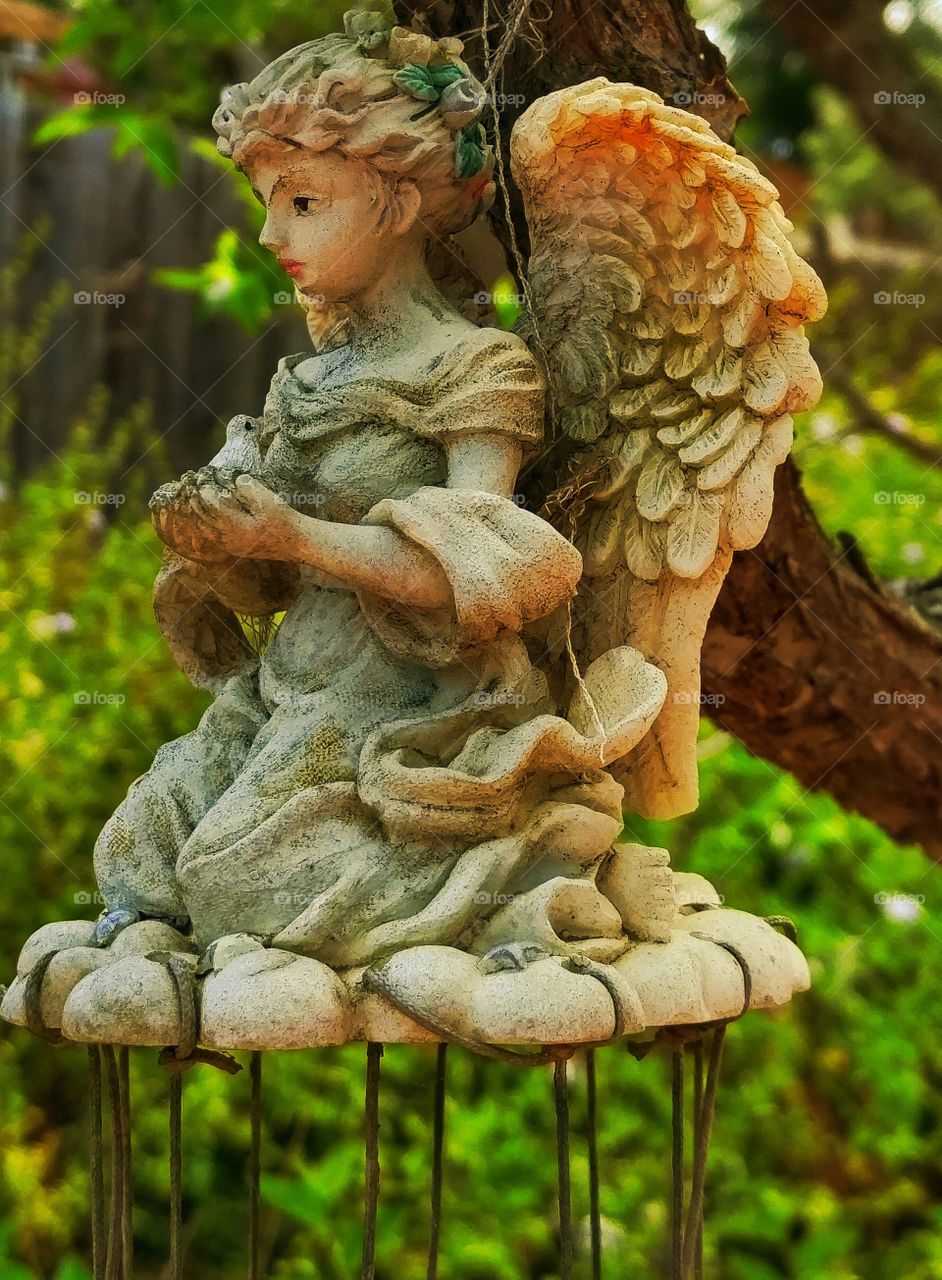 GARDEN ANGEL. She watches over all living creatures.
