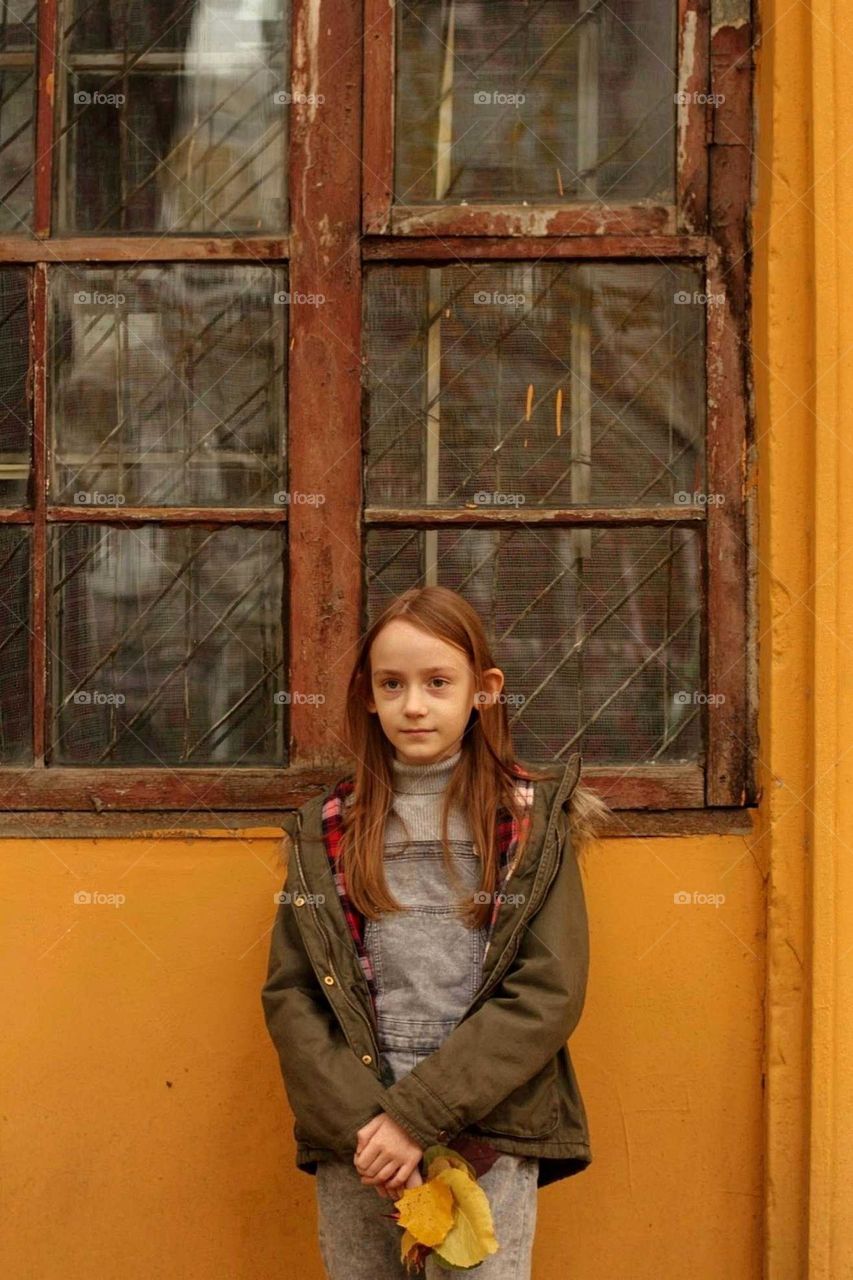 Girl near the window