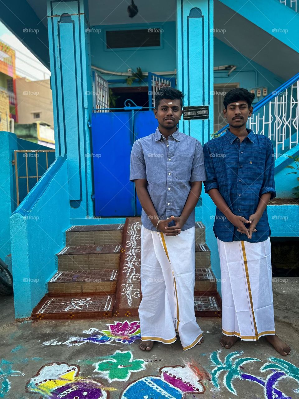 South Indian brothers wearing traditional clothes and celebrating Sankranthi/Pongal 