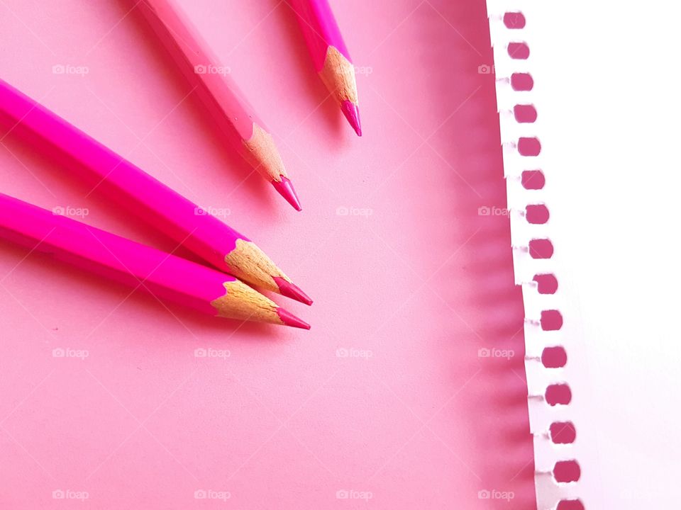 Pink pencil on background