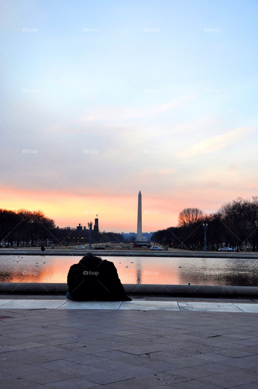 Couple sitting together at lafayette park, washigton