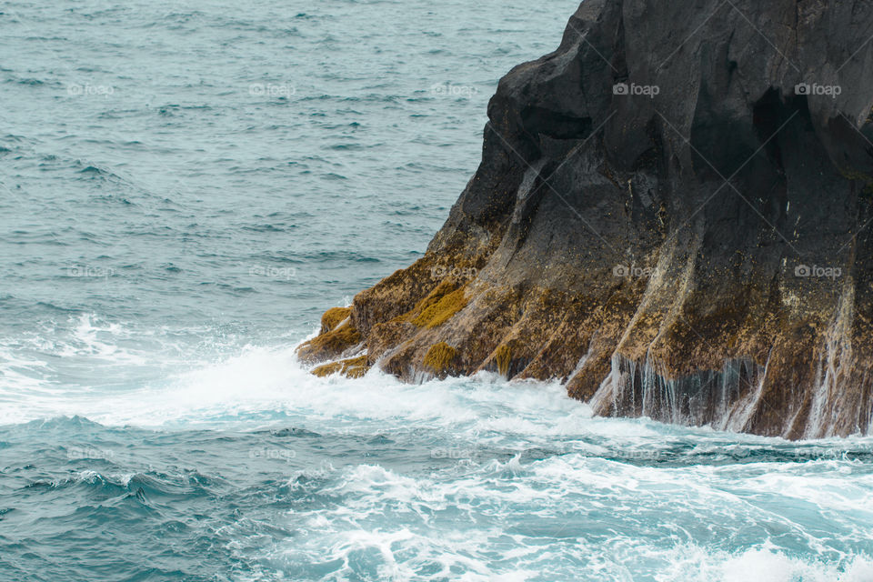 View of cliff in sea