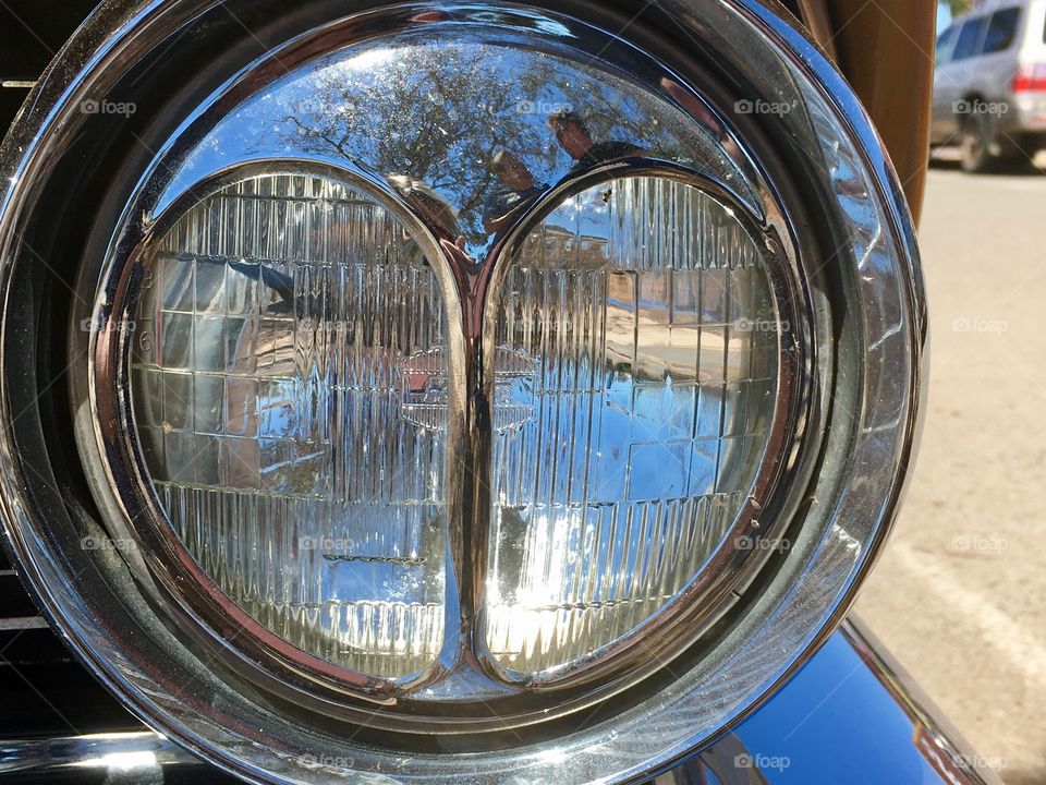 Circa 1961 Cadillac deVille cats eyes headlights lamps