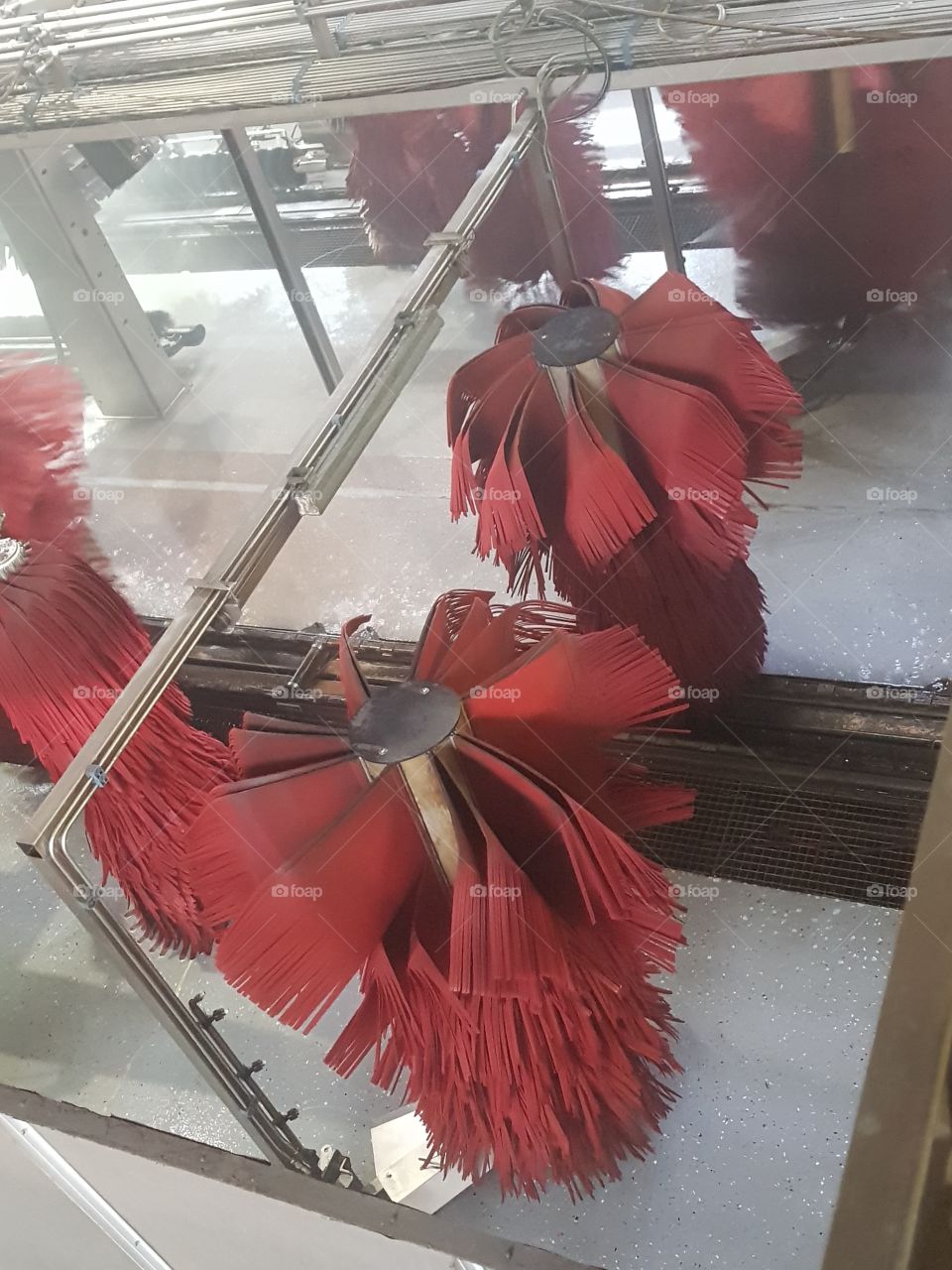 Car wash brushes RED. By BOB car wash te Schiedam The Netherland