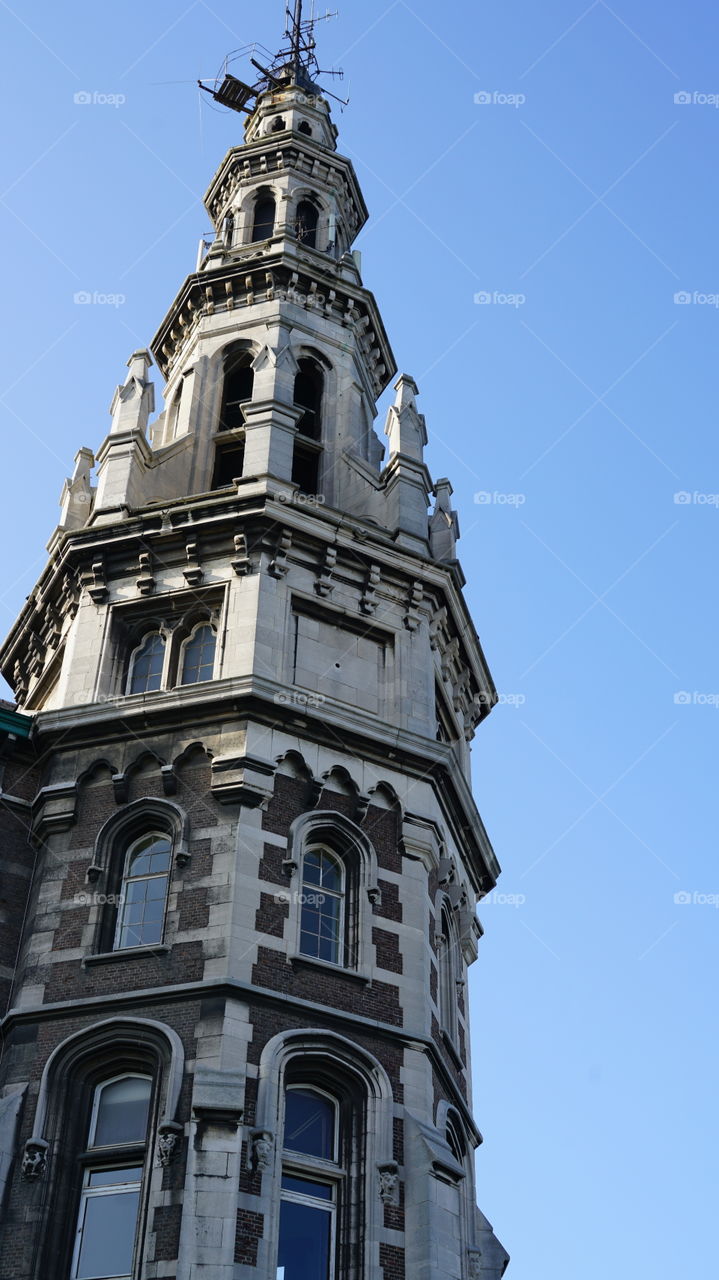 Old tower of a building in Antwerp, Belgium.
