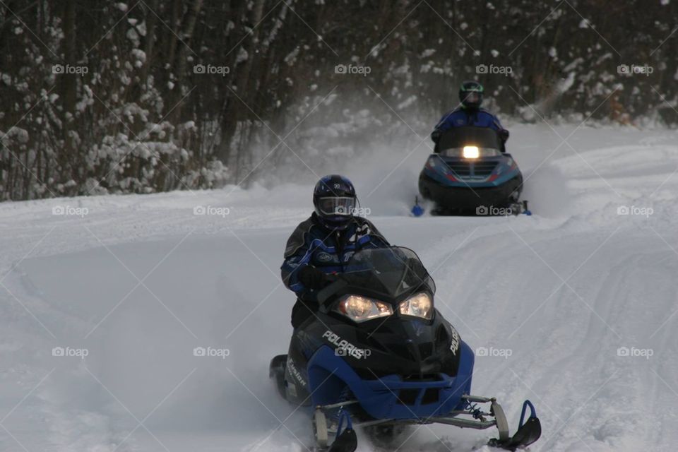 Snowmobile riders