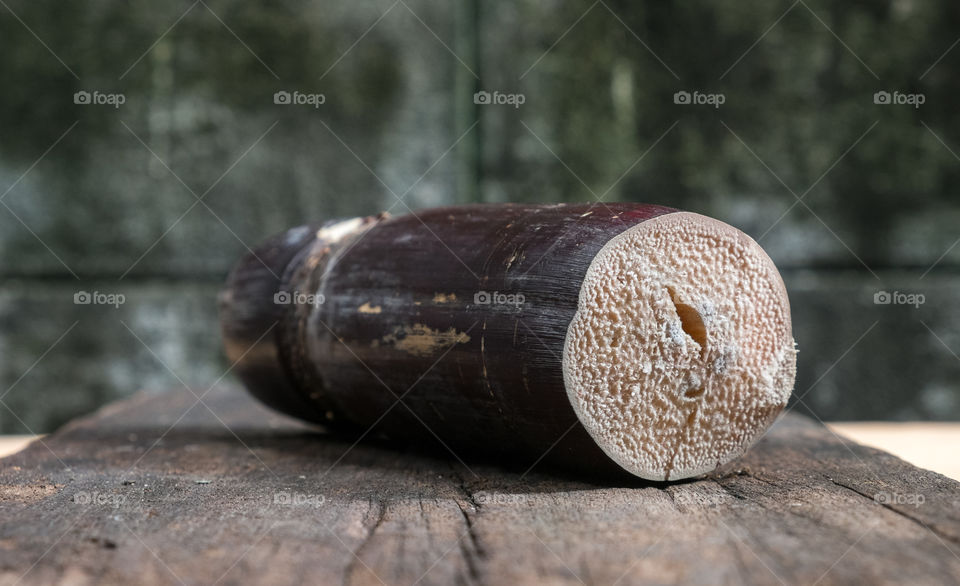 sugar cane on the dark wooden