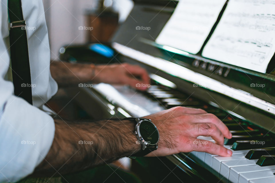 Man playing a piano 