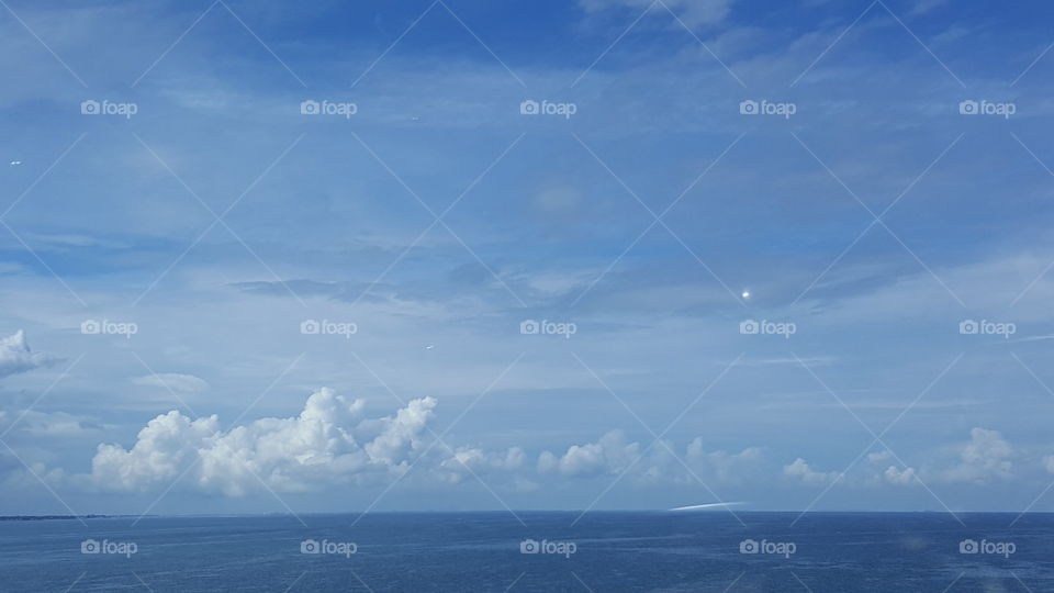 The waters of Tampa Bay seem to stretch all the way to the clouds.