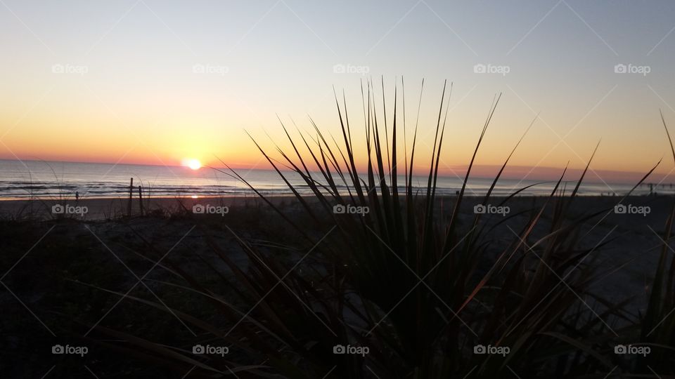 I captured this photo of the sunrise on the Atlantic Ocean in Jacksonville Beach Florida.