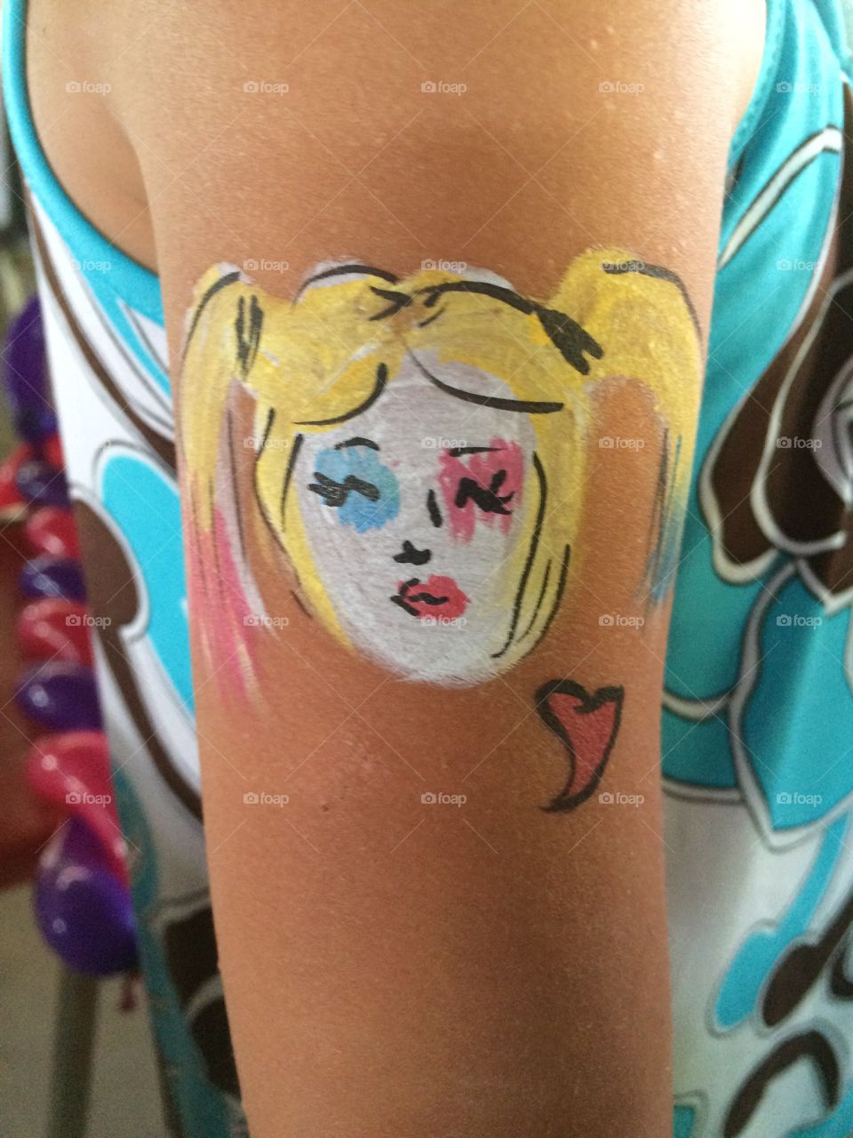 Harley Quinn face paint tattoo 