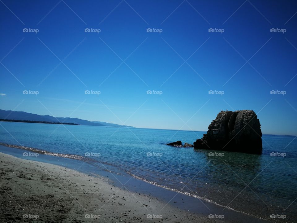 ancient tower on poetto beach