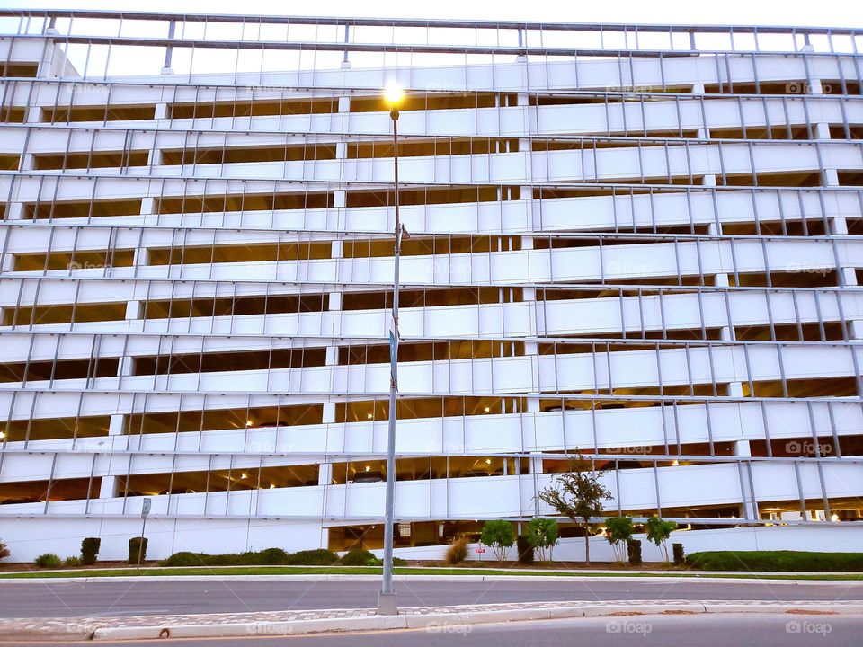 White multilevel parking garage