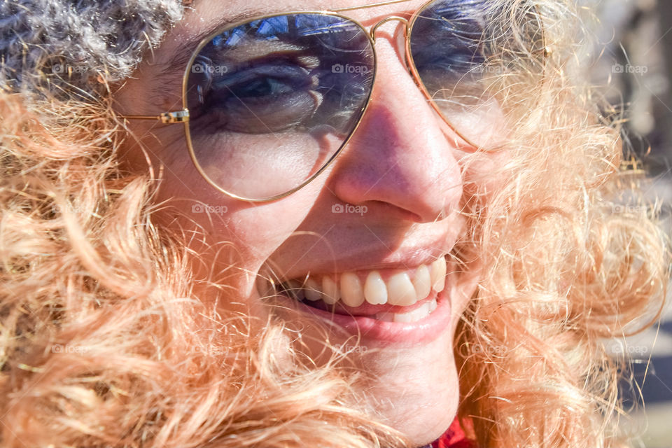 Beautiful Happy Smiling Woman Wearing Sunglasses