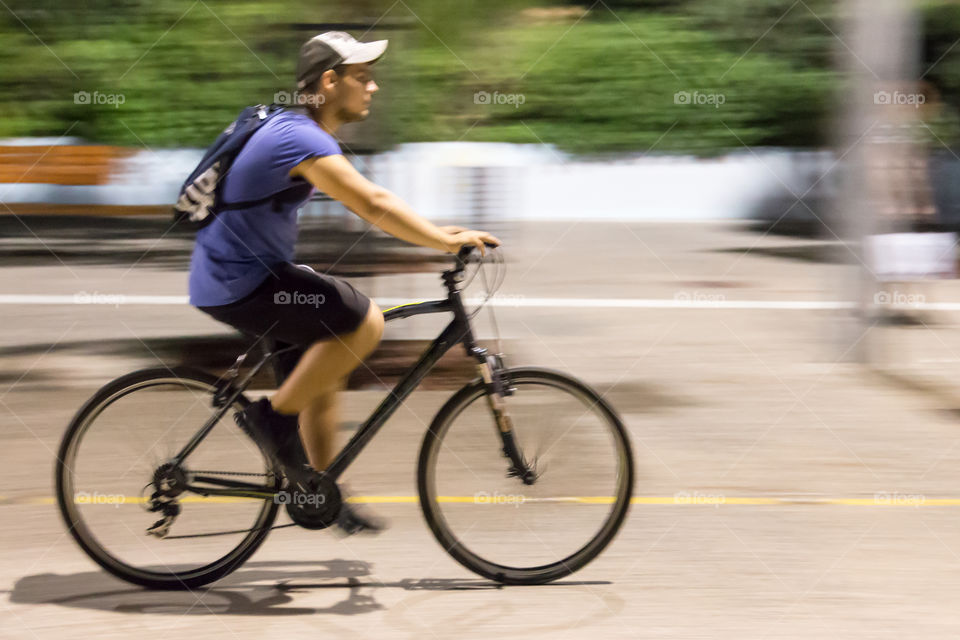 Young Man On Bike Ride In The City
