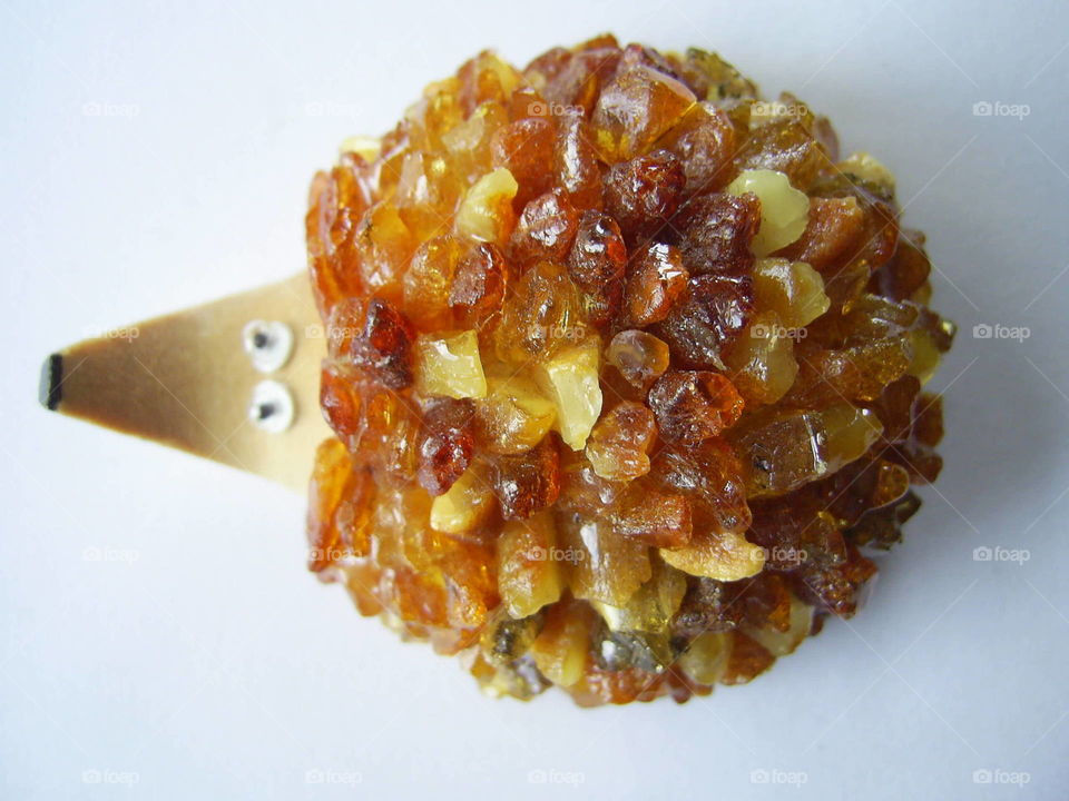 Baltic amber and wood hedgehog