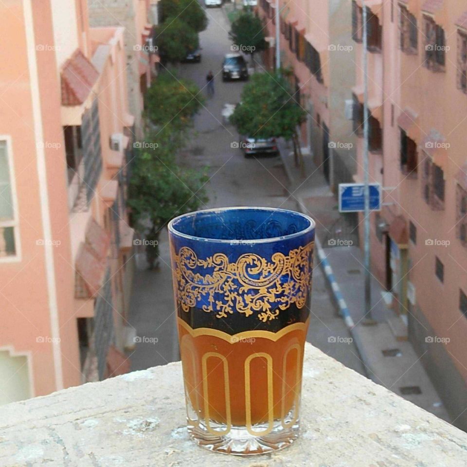 Beautiful cup of tea and view to street.