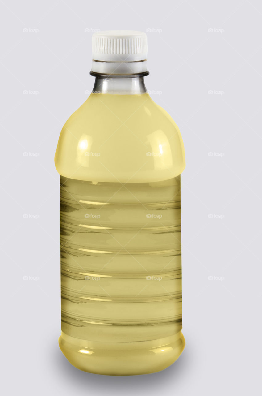 Yellow bottle on White background