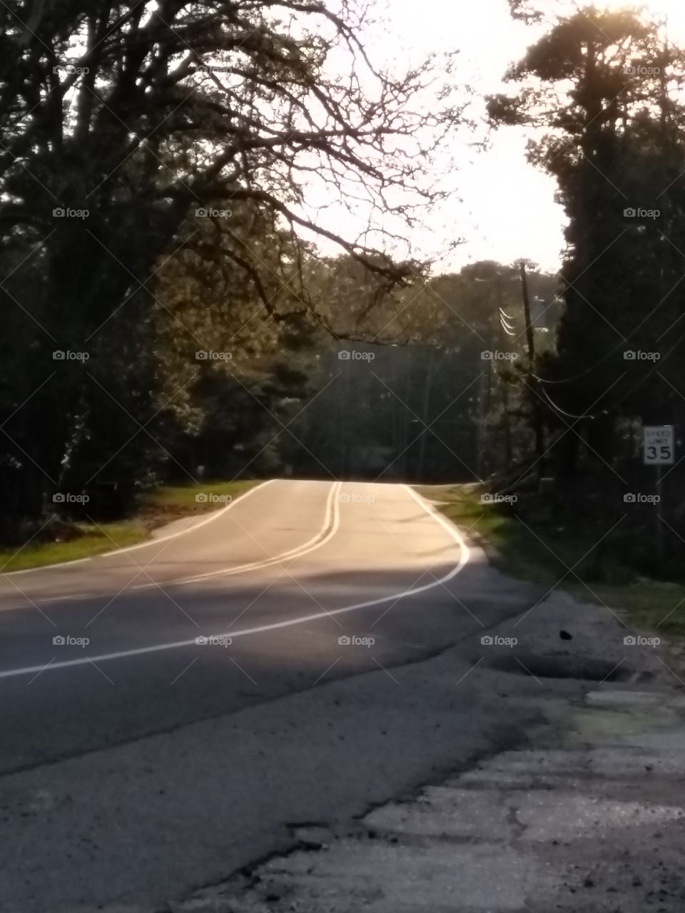 Unoccupied road at dusk in a small country town in the foothills of North Carolina.