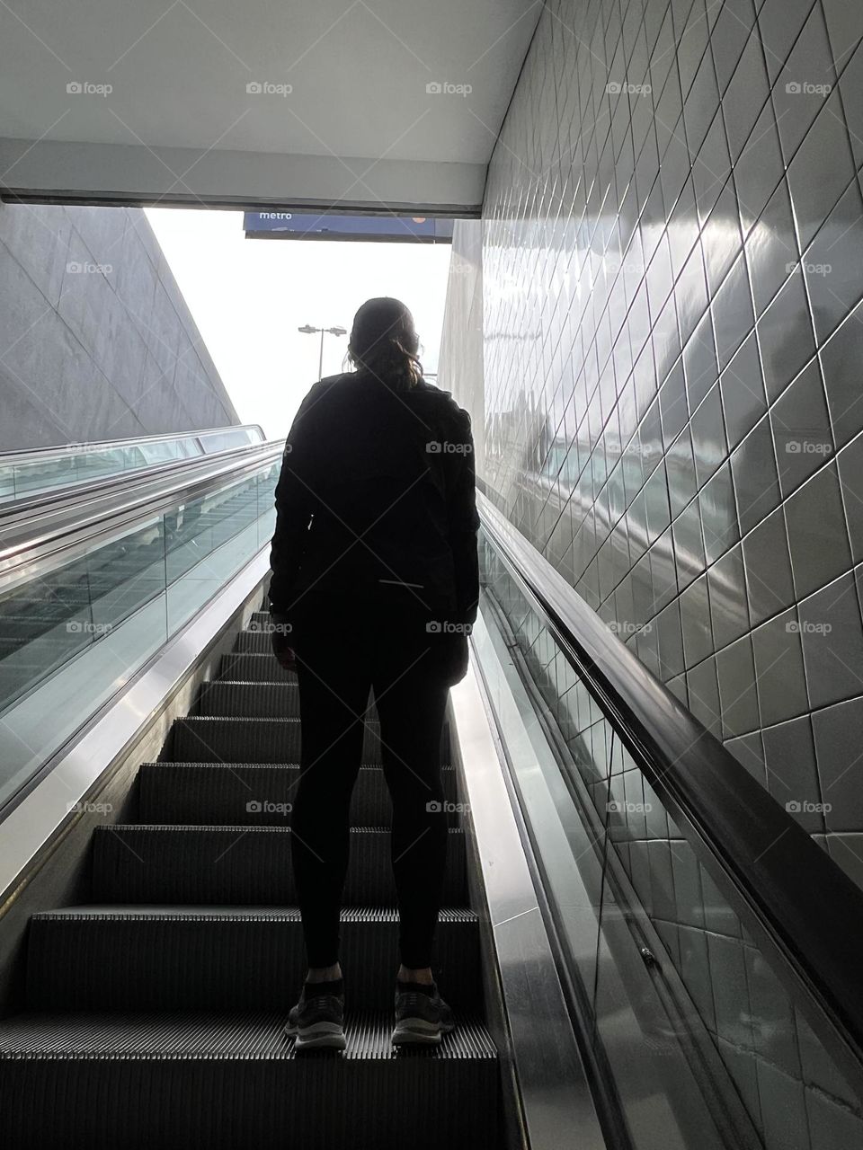 On the escalator 