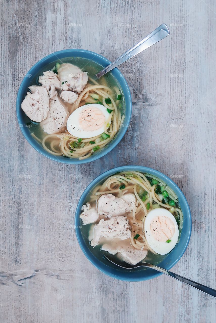 High angle view of soup with egg in bowl