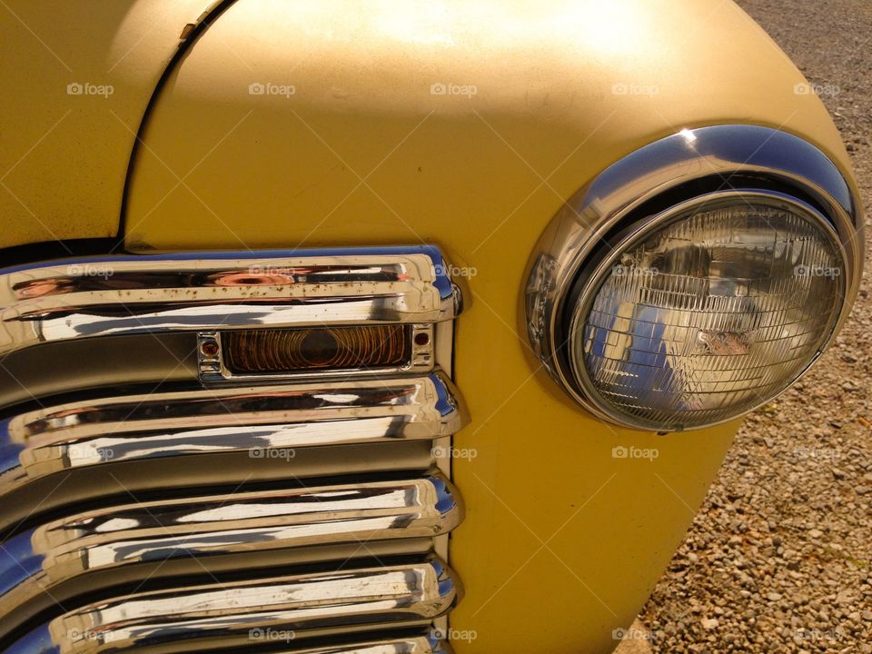 Vintage headlight and grill automobile