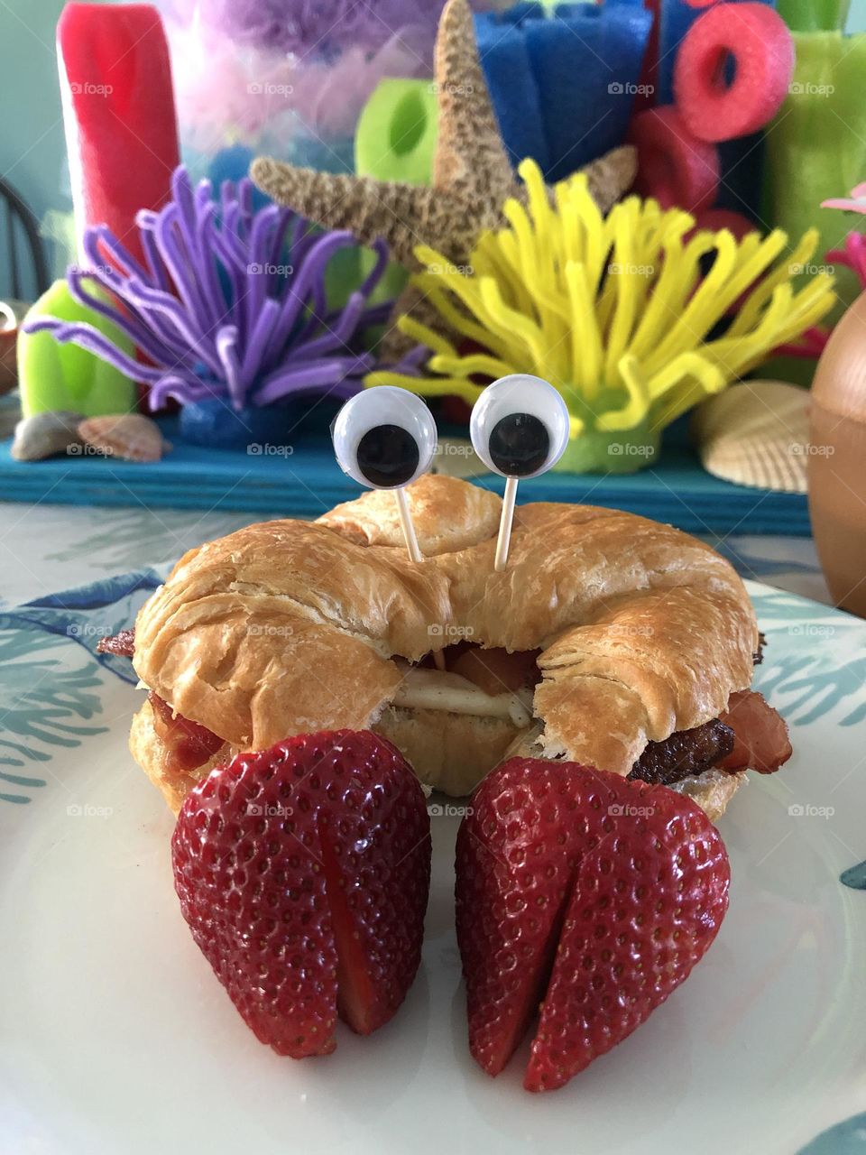 Breakfast croissant shaped as a crab 