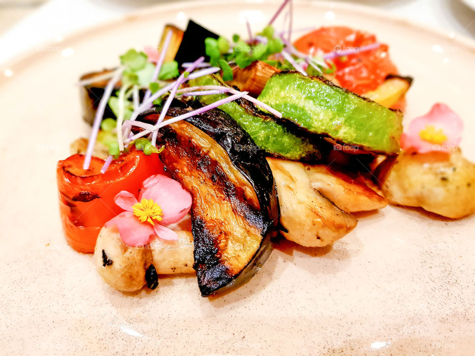 Grilled vegetables in salad on the plate.